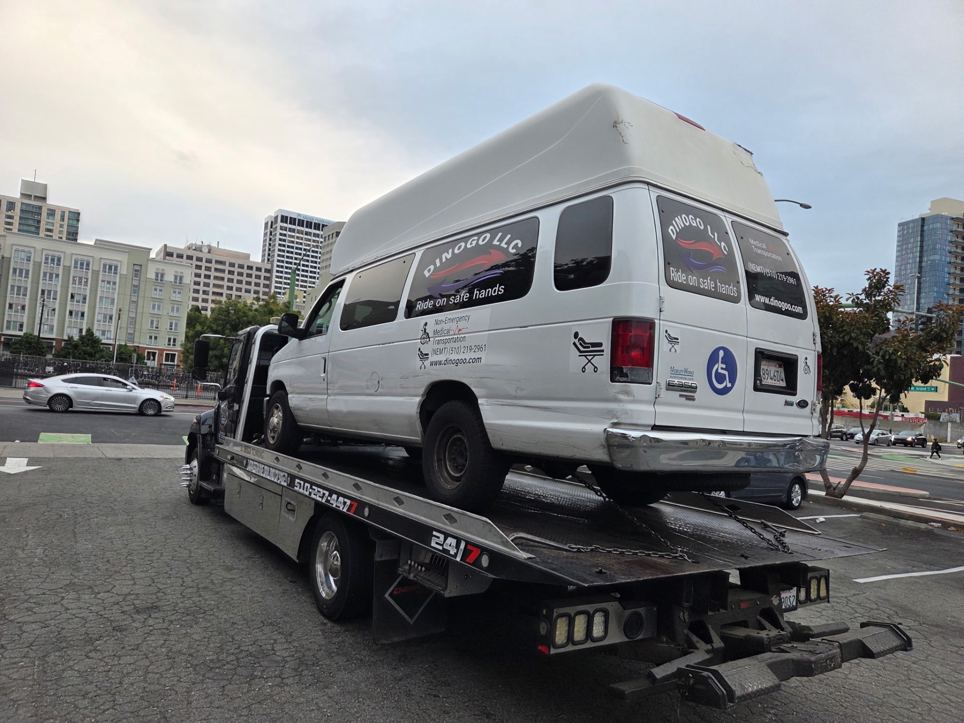 Ford E-350 high-roof van loaded in downtown Oakland